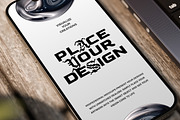 iPhone Mockup on Wooden Desk, a Device Mockup by Jiwstudio (Thumbnail 8 of 9)