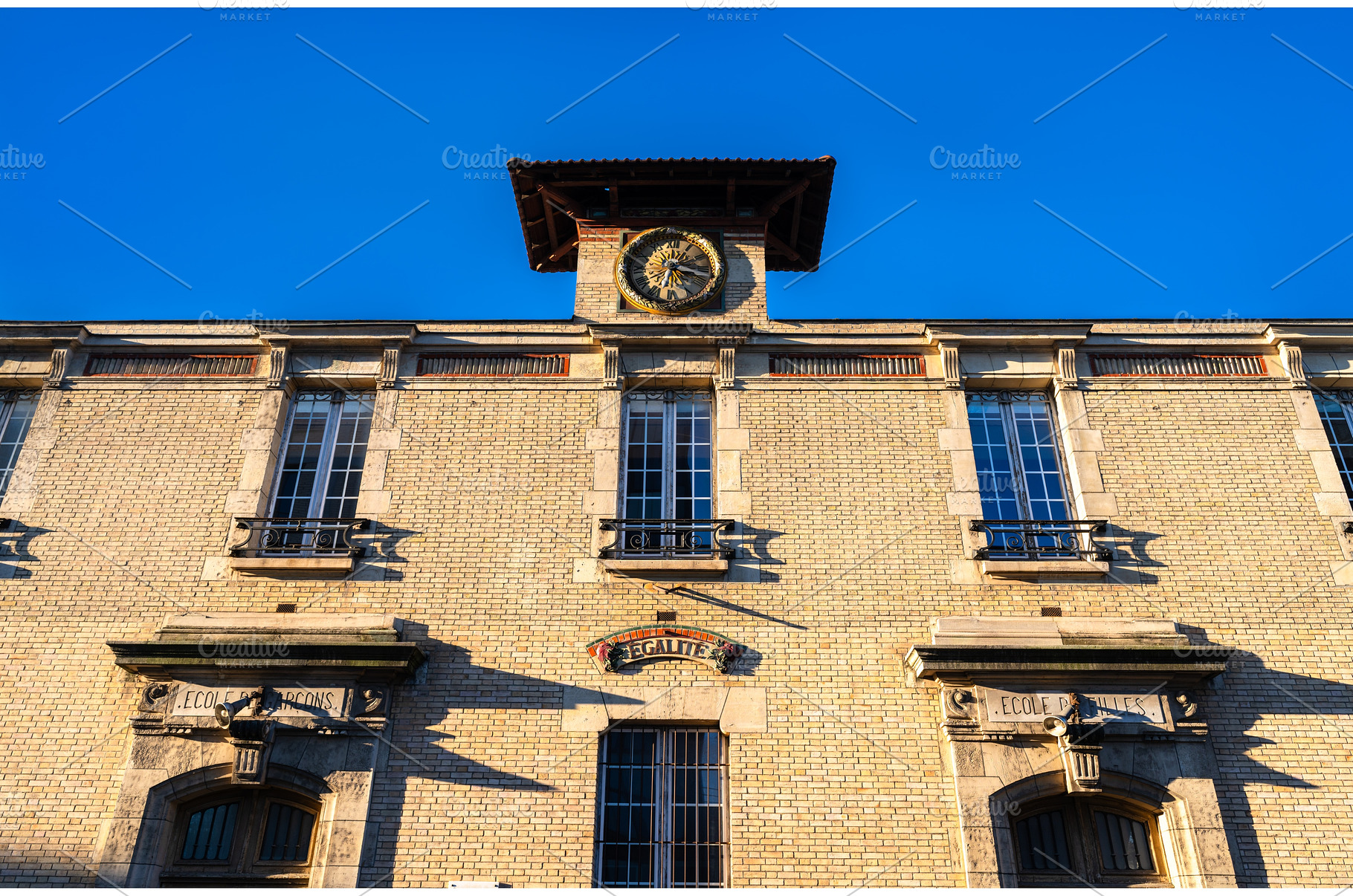 Historic school building facade with, an Architecture Photo by Leonid Andronov