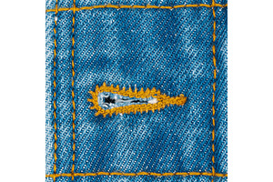 Close up of denim fabric buttonhole