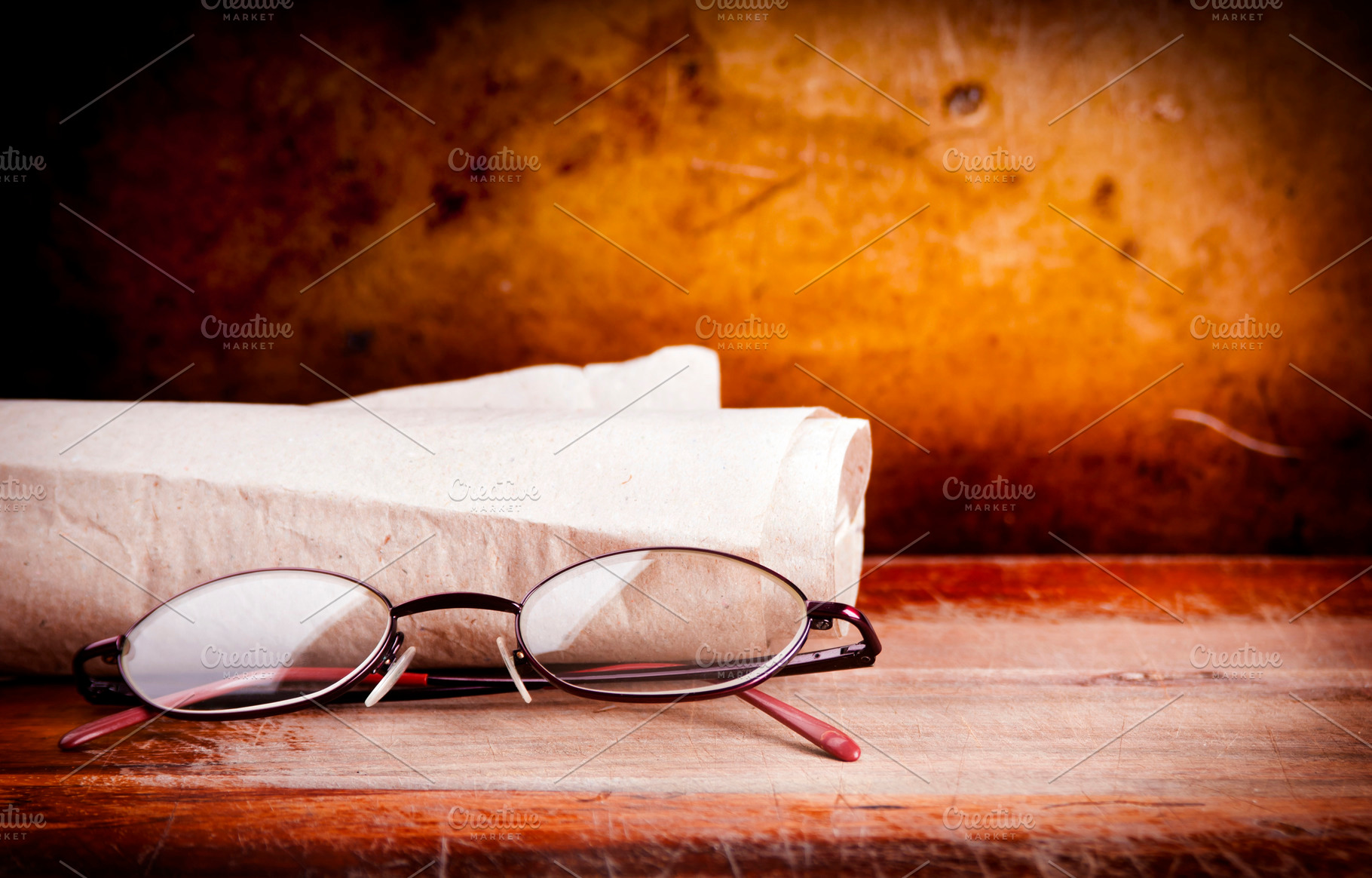 Old Glasses on Desk, a School & Education Photo by THP Creative
