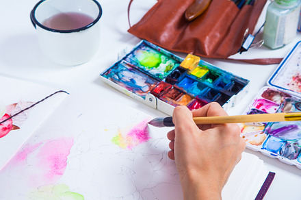 Artist draws pink flowers stock photo containing artist and drawing, an Arts & Entertainment Photo by Sova