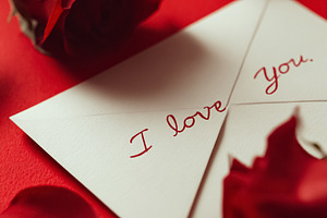 Romantic Valentine's Day love letter with handwritten message an, a Photo by Studio ANNA