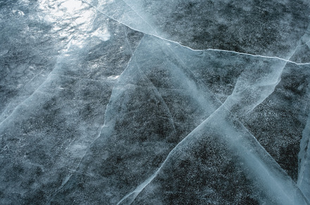Sun reflecting in the cracked ice, an Abstract Photo by Studio Light & Shade