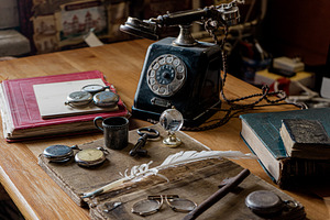 antique desk with accessories, an Arts & Entertainment Photo by VetalStock