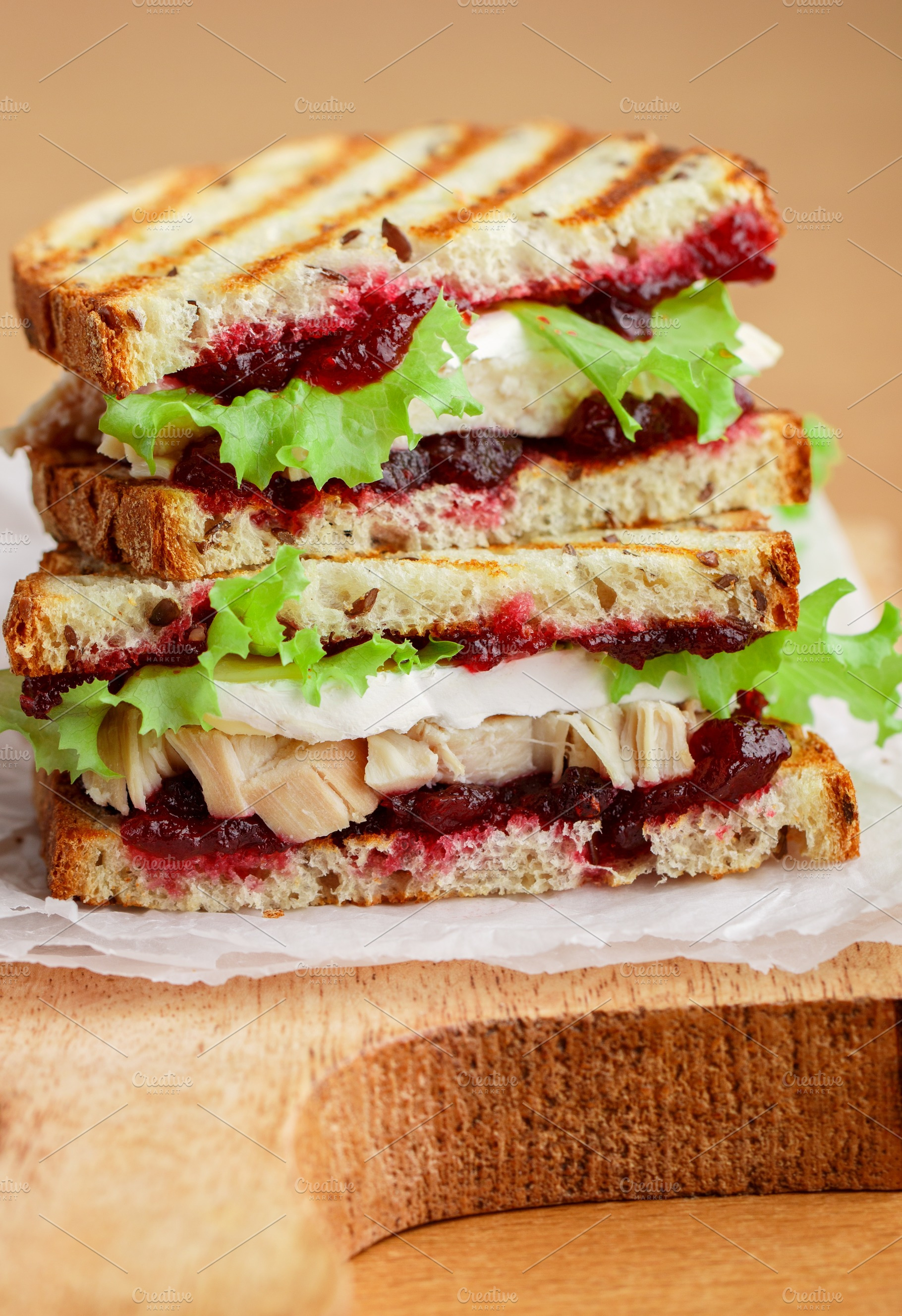 Turkey or chicken sandwich featuring berries, berry, and board, a Food & Drink Photo by La_Vanda
