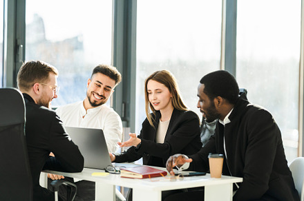 Group of young business partners, a Photo by borodai94