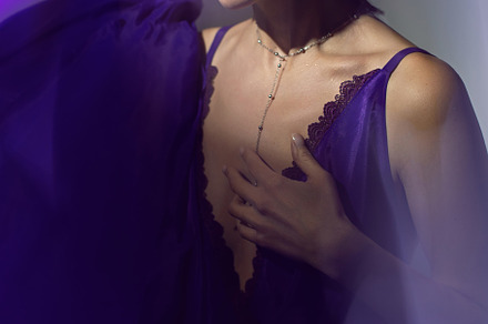 portrait of a brunette woman in a purple dress on white background in the studi, a Person Photo by SaulichPhoto