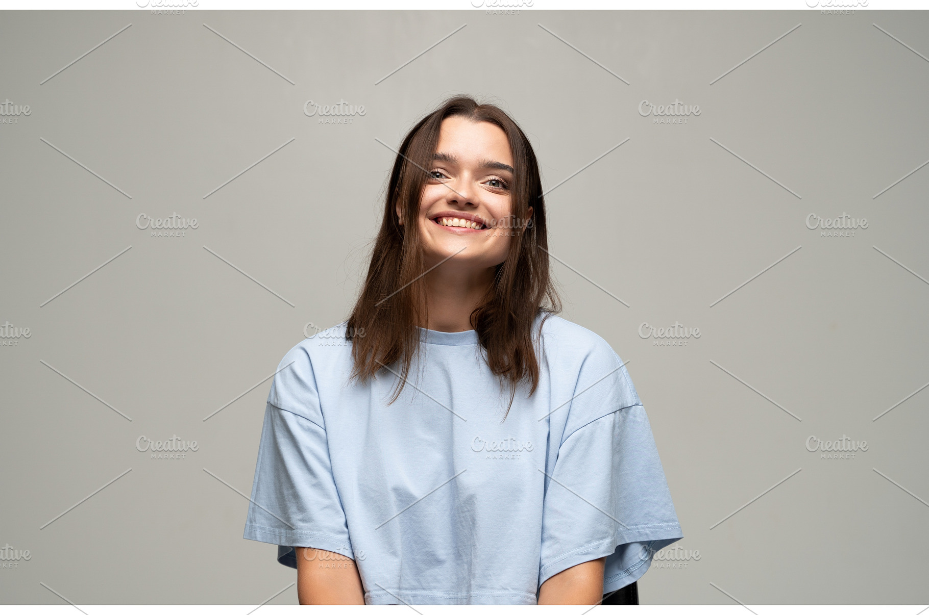Young woman smiling, expressing, a Person Photo by volodymyrshtun13795