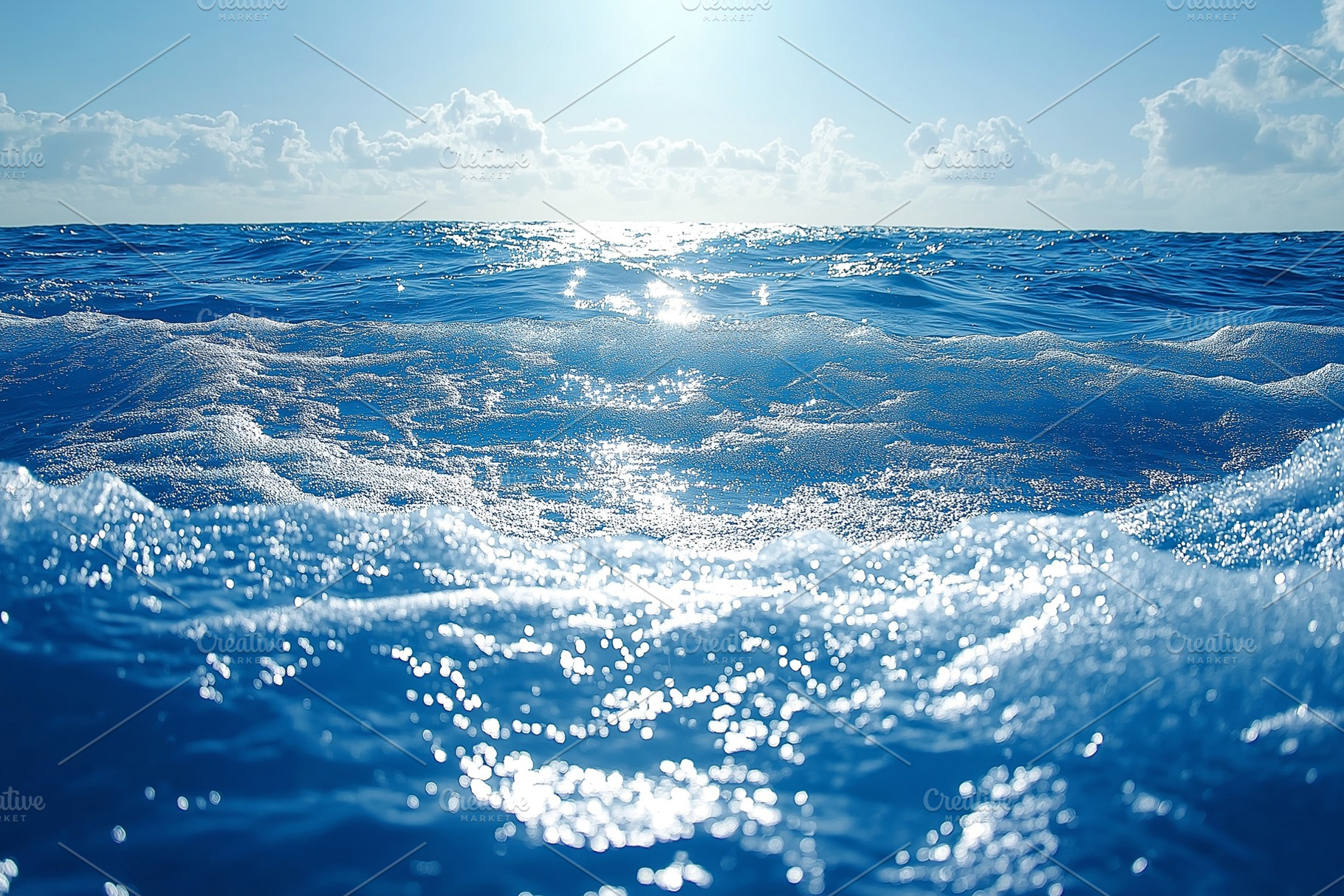 A serene ocean view, with shimmering blue waves and soft white foam reflecting, a Background Photo by ImageMir