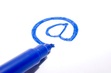 arroba symbol drawn with blue marker
