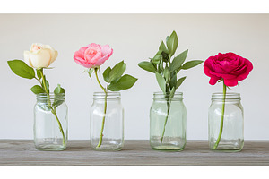 Four Various Flowers Arranged in, a Nature Photo by Lermont51
