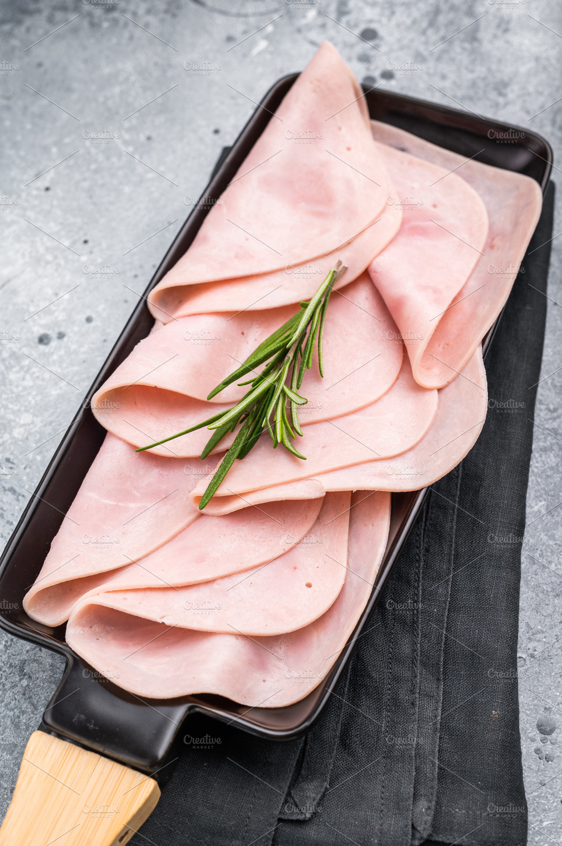Gourmet sliced ham on a rustic board, inviting you to explore de, a Food & Drink Photo by composter-box@mail.ru
