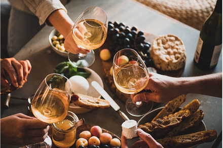 Group of unrecognizable people, a Food & Drink Photo by Foxys