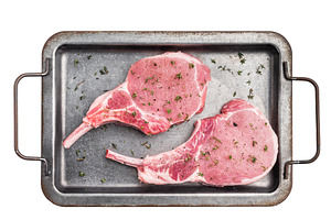 Stunning uncooked pork Tomahawk chop steak, promising tenderness, a Food & Drink Photo by composter-box@mail.ru