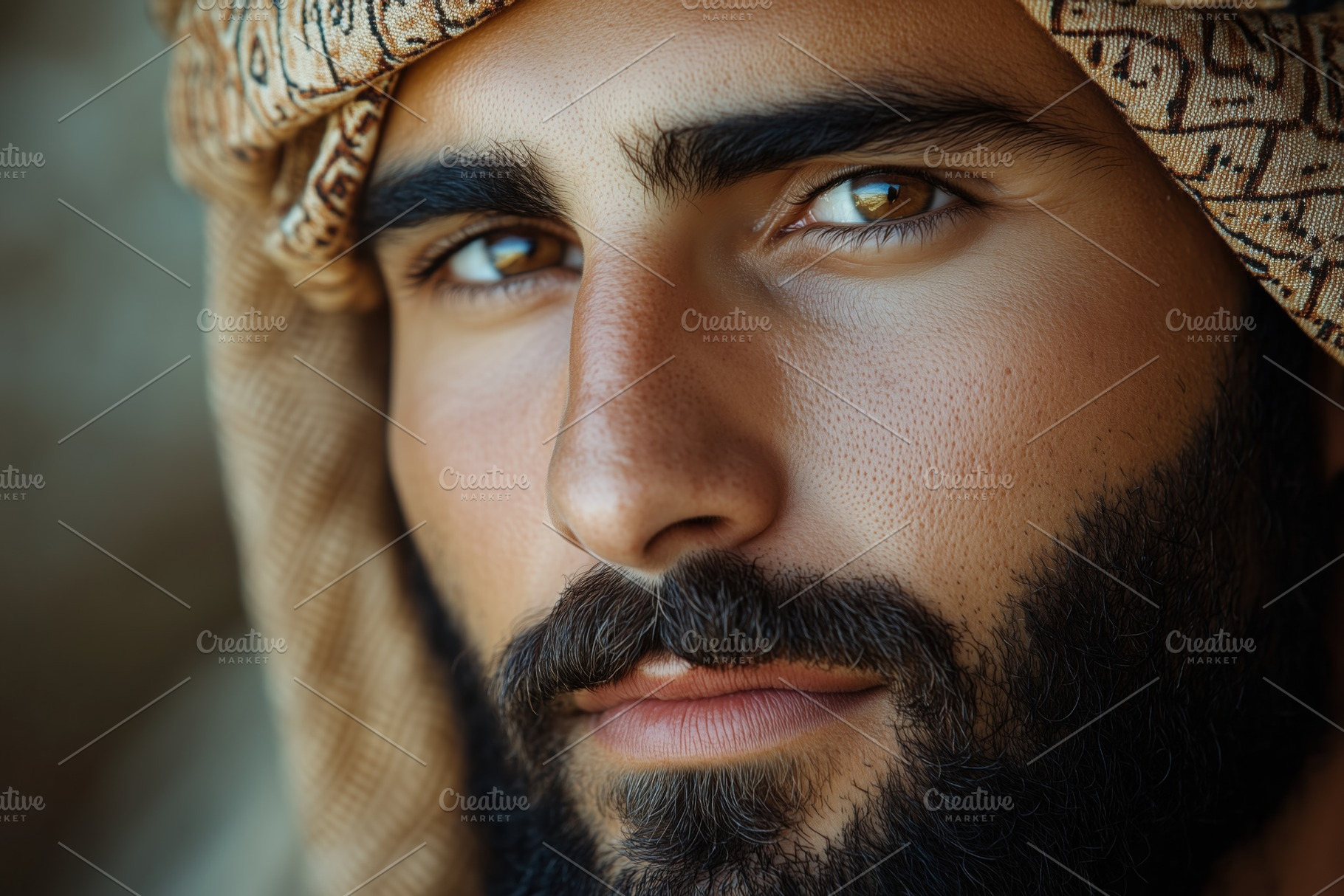 Close-up portrait of a young arabic man with a well-groomed beard and intense g, a Person Photo by Textures & Backgrounds