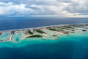 Aerial view of Rangiroa atoll, French Polynesia, with lagoon and, a Photo by GoodGoods