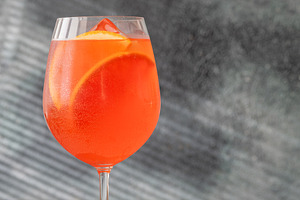Vibrant Campari Spritz cocktail with citrus ice bubbles elegant