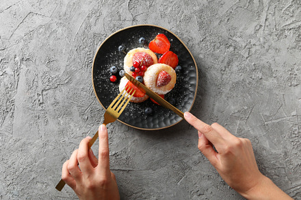 Concept of tasty sweet food, cheese pancakes, top view, a Food & Drink Photo by AtlasStudio PRO