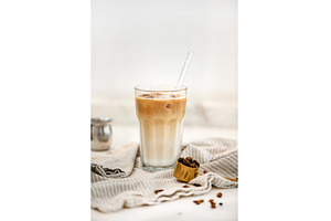 Iced latte coffee drink in tall