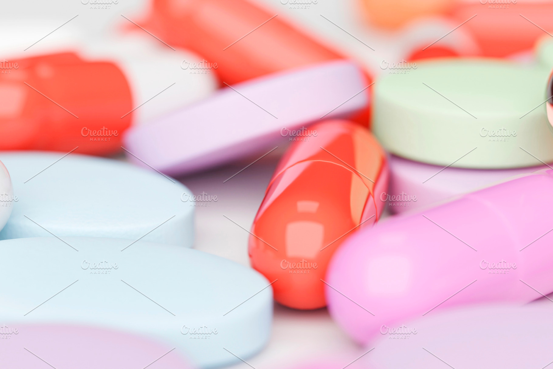 Close-up of colorful pills and capsules on white surface, a Health & Medical Photo by RF Images