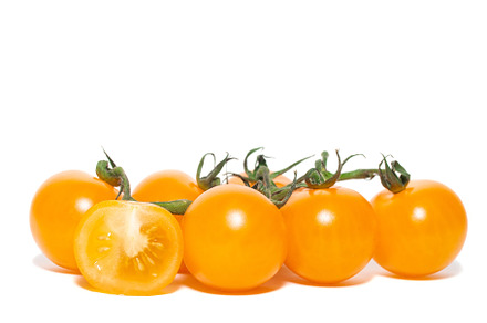 yellow tomatoes on white background, a Food & Drink Photo by AlexBush