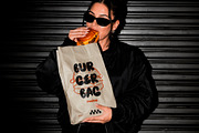 Woman with Delivery Bag Mockup, a Packaging Mockup by The Rose Project (Thumbnail 2 of 3)