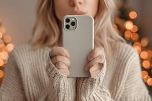 Holding a phone in a cozy setting, a Photo by Beautiful things