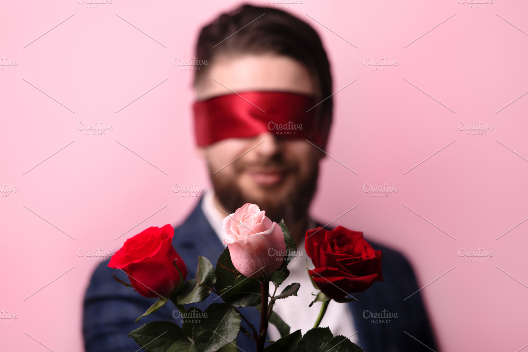 Blindfolded Man with Roses, a Person Photo by Ales Munt