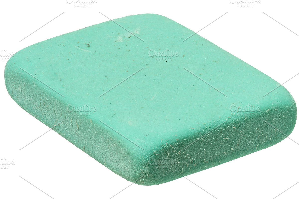 Close up of one green rectangular eraser on isolated background, an Abstract Photo by ndanko (Photo 2 of 2)