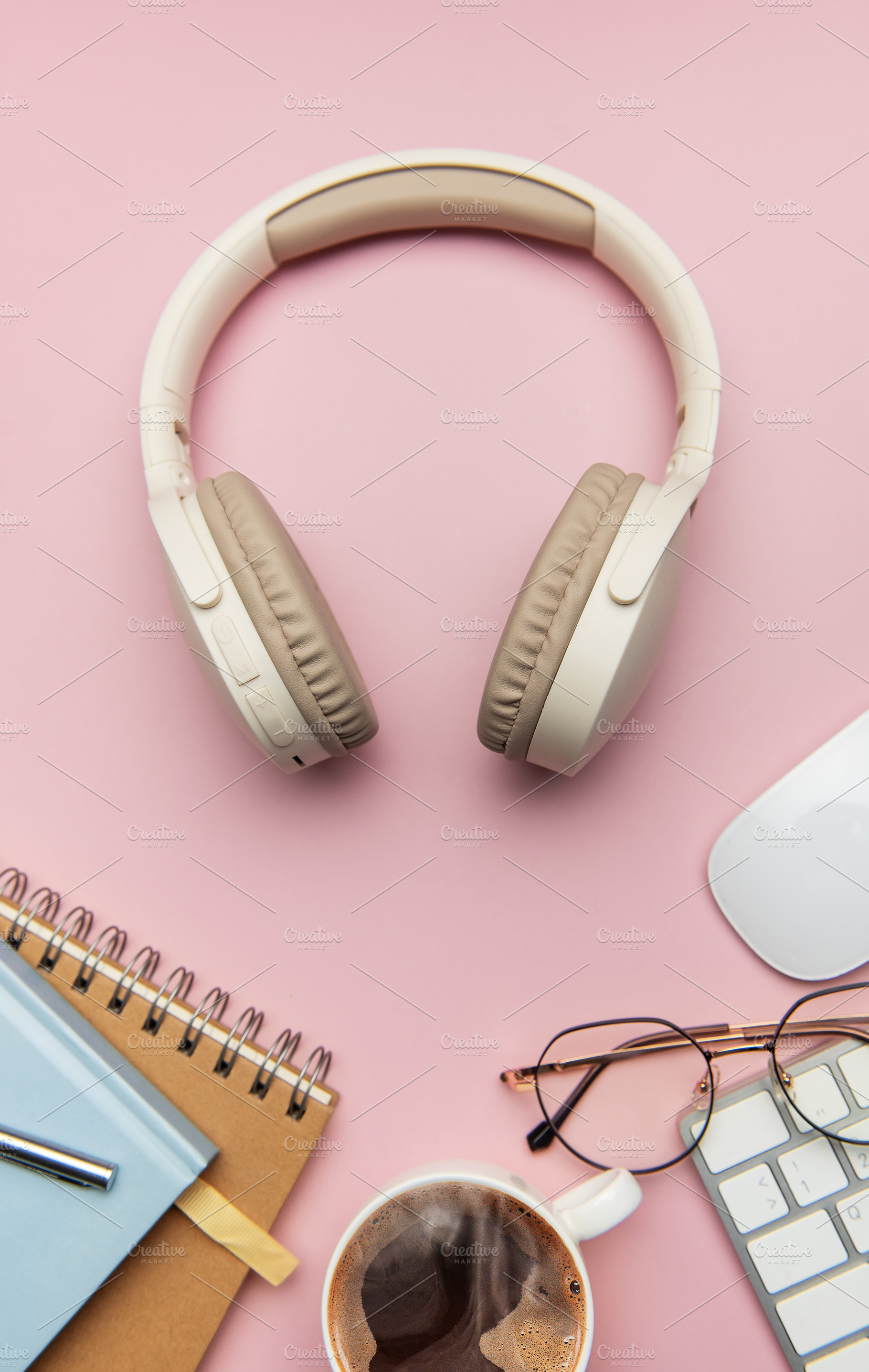 Wireless headphones, coffee, keyboard, eyeglasses, and notebook, a Business Photo by Olena Rudo