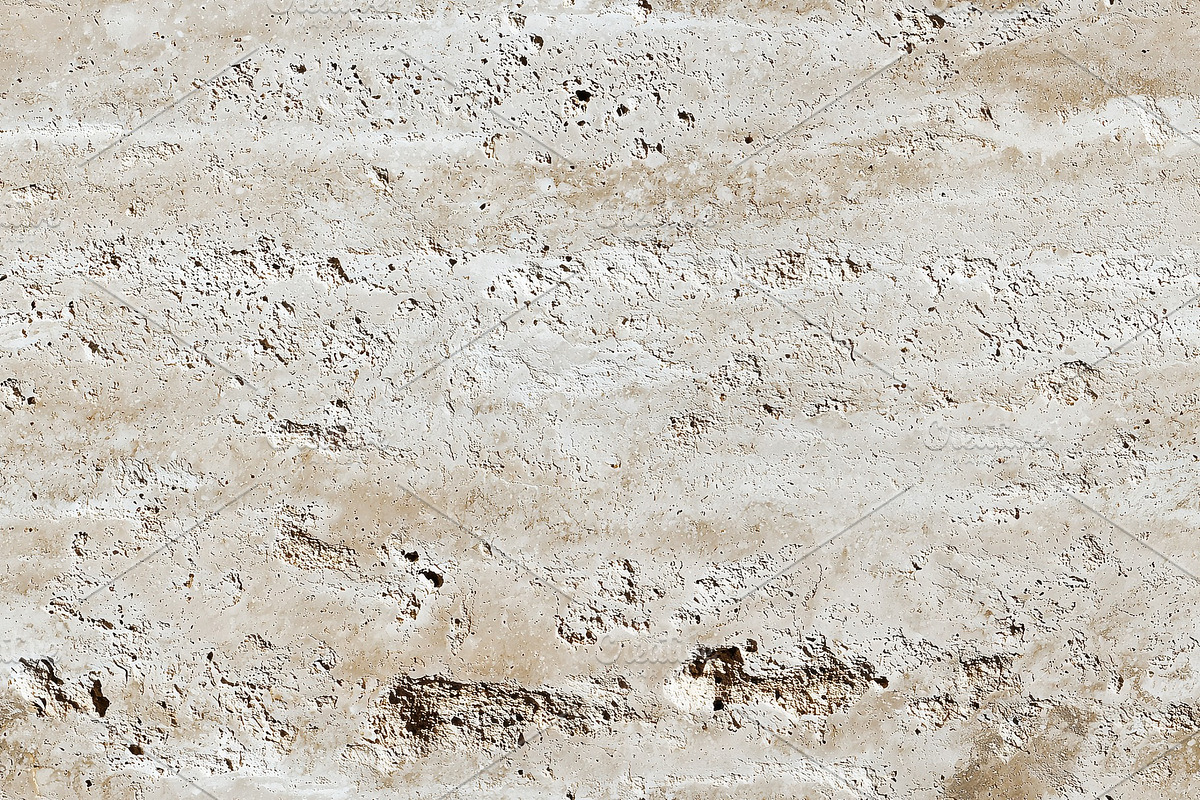 Textured stone surface with light beige and cream colors, featuring ...