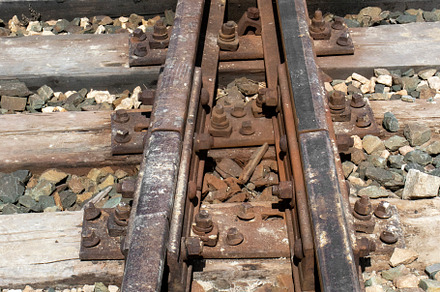 Rusty rails stretch into the distanc