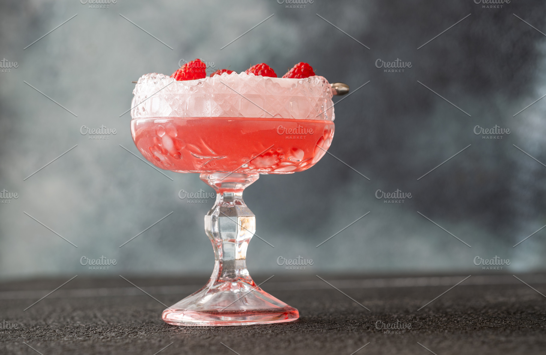 Elegant Clover Club cocktail with velvety foam fresh raspberries, a Food & Drink Photo by Alexander Prokopenko