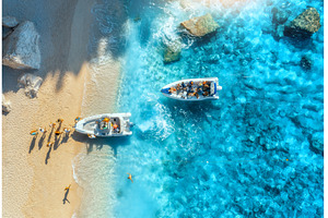 Aerial view of boat, sandy beach