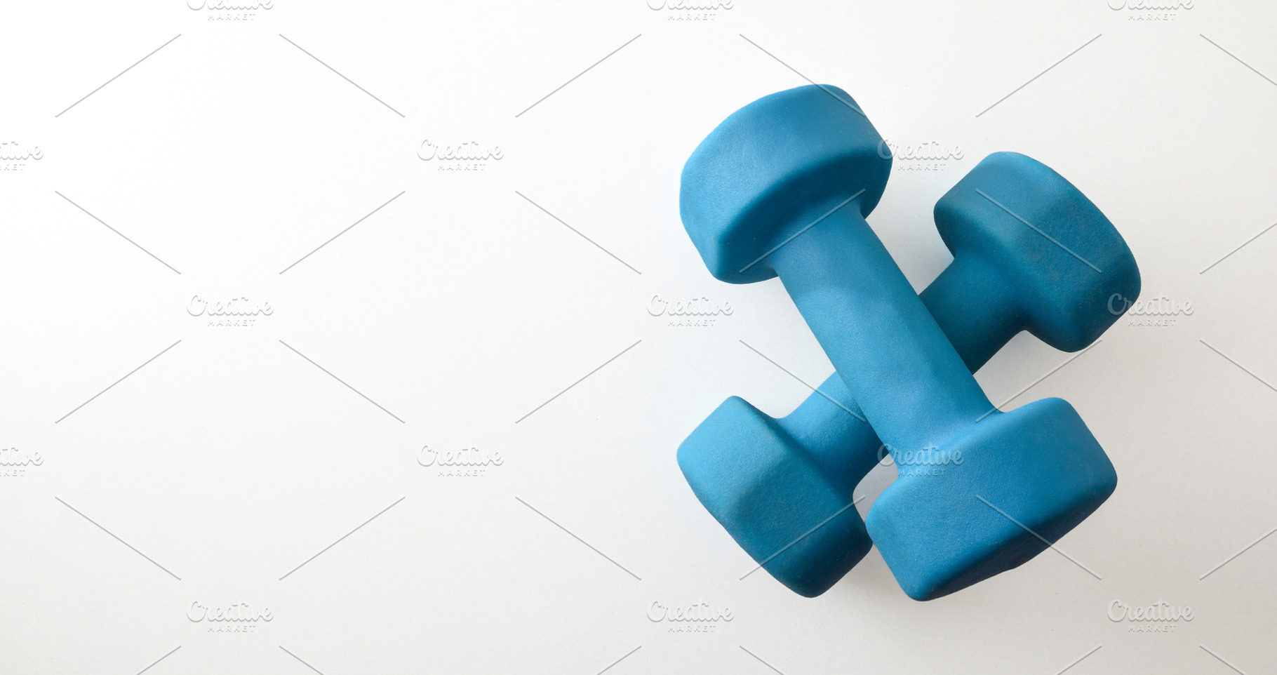 Crossed Blue Dumbbells on White, a Sports & Recreation Photo by Davizro's Market