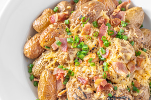 Baked baby potatoes with bacon, a Food & Drink Photo by Alexander Prokopenko