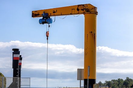 Dockside Yellow Crane by the Water, an Industrial Photo by Perpis