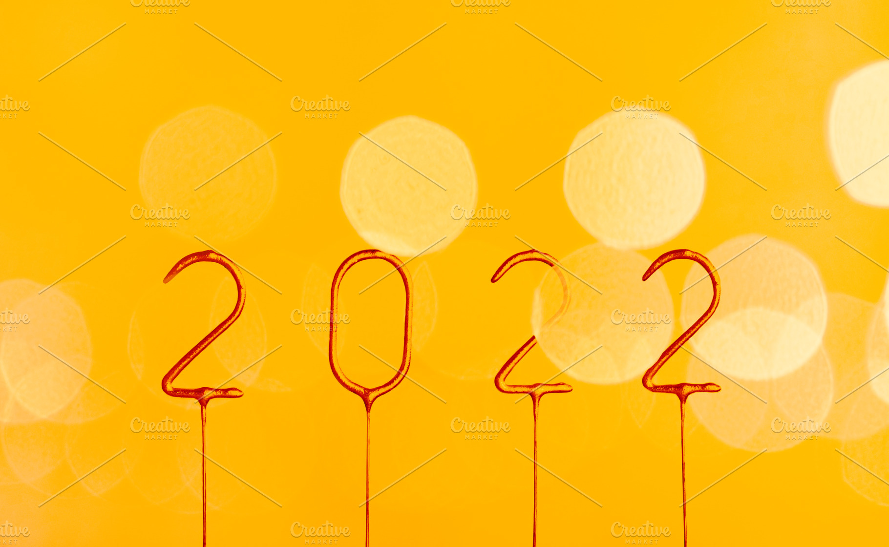 2022 golden numbers on yellow bokeh, a Holiday Photo by Olha Kozachenko