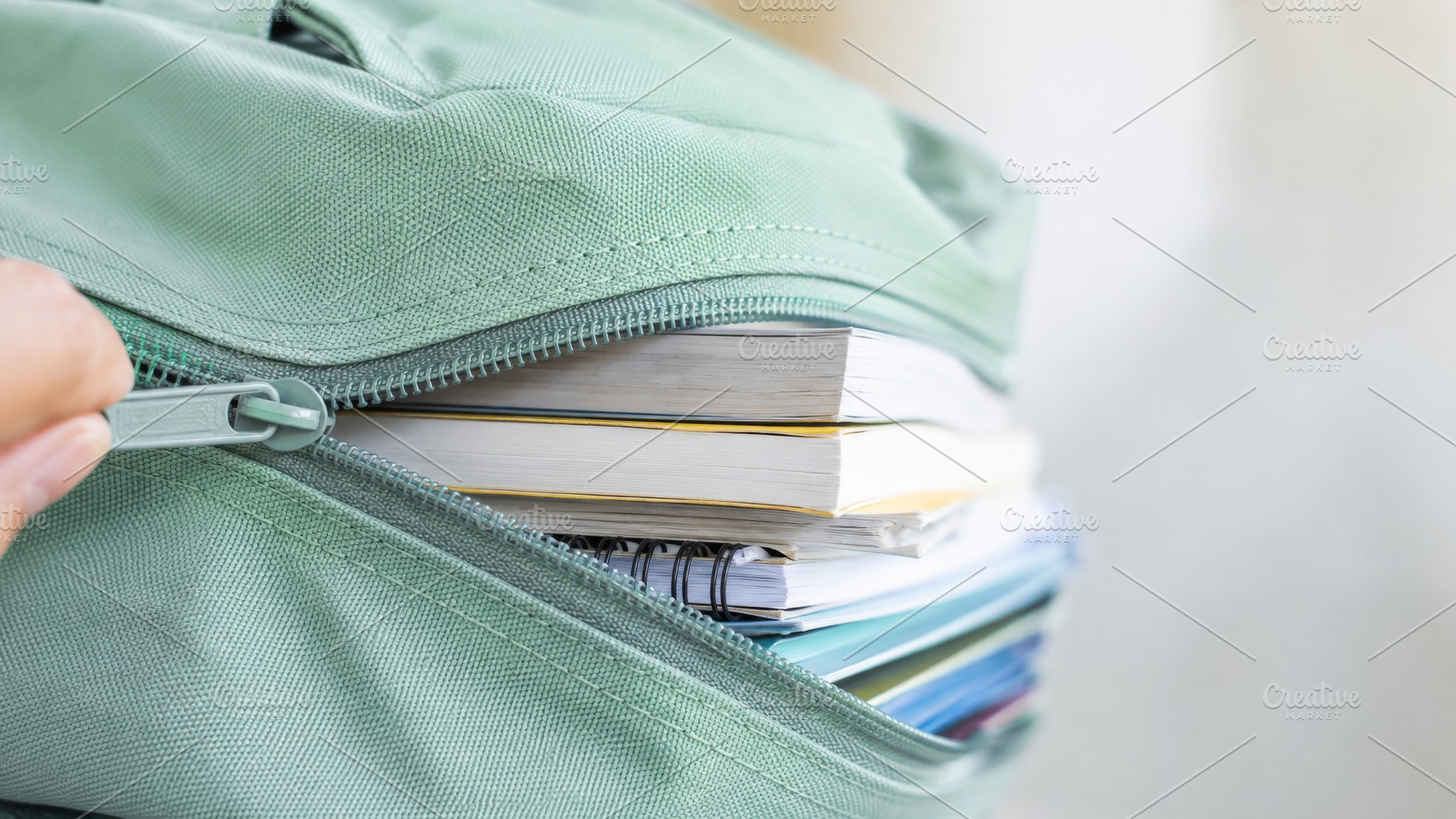 Closeup of books and notebooks insid, a Photo by Dvoevnore photos