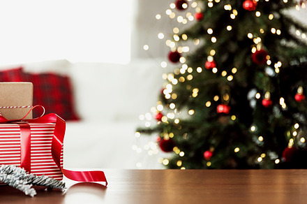 Christmas, New Year background. Empty wooden tabletop with bokeh fir tree, gift, a Holiday Photo by Lenor4ik