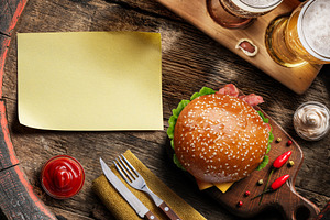 Glasses of beer, hamburger, a Food & Drink Photo by Volff