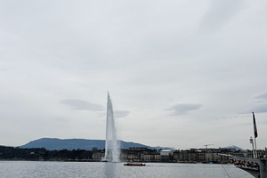 Fountain on the lake in Geneva, Switzerland with scenic cloudy sky backdrop, a Photo by AS photostudio