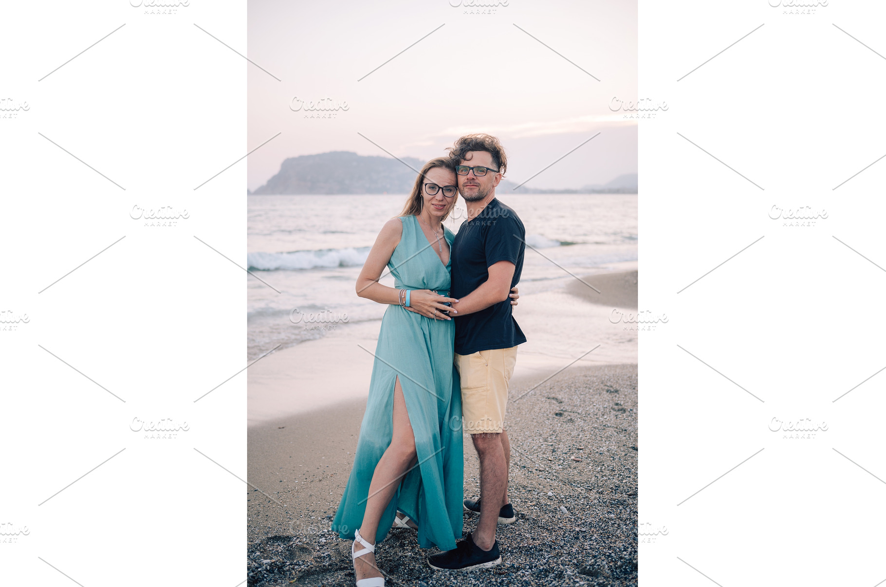 Happy Couple Embracing on a Sandy, a Person Photo by Jan Jack Russo Media