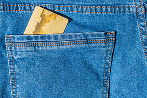 Plastic bank card in blue jeans pocket, a Business Photo by Vapi