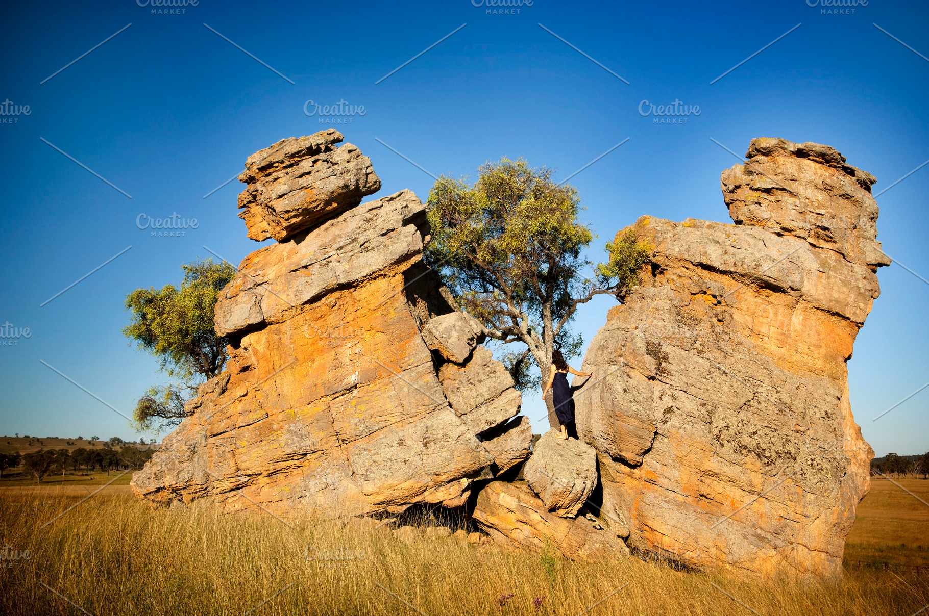 Split Rocks with Woman, a Person Photo by THP Creative
