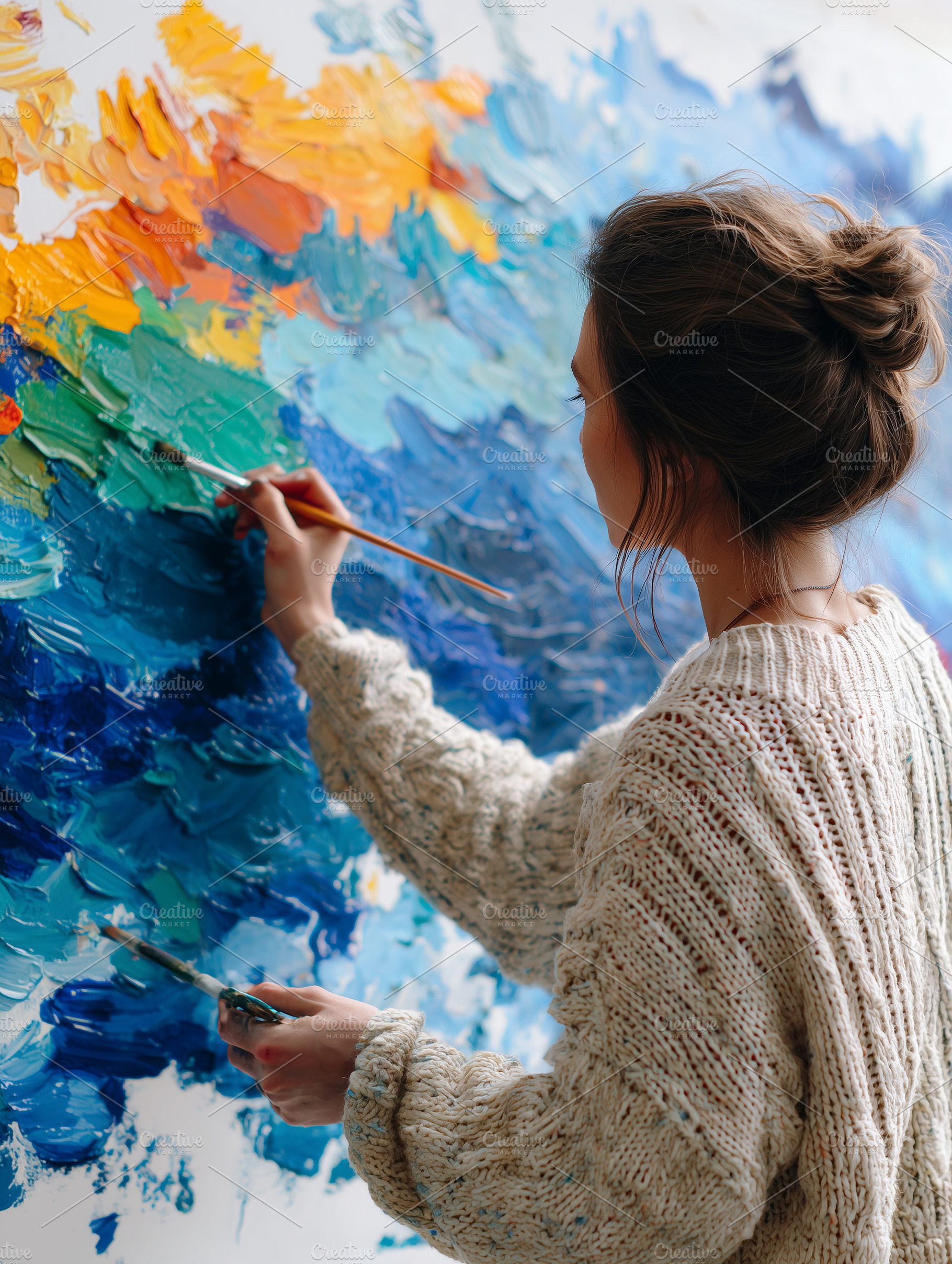 Female artist painting a colorful, an Arts & Entertainment Photo by MistyDay