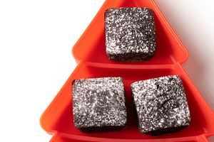 Chocolate brownies with powdered sugar in Christmas tree tray, a Food & Drink Photo by etorres69