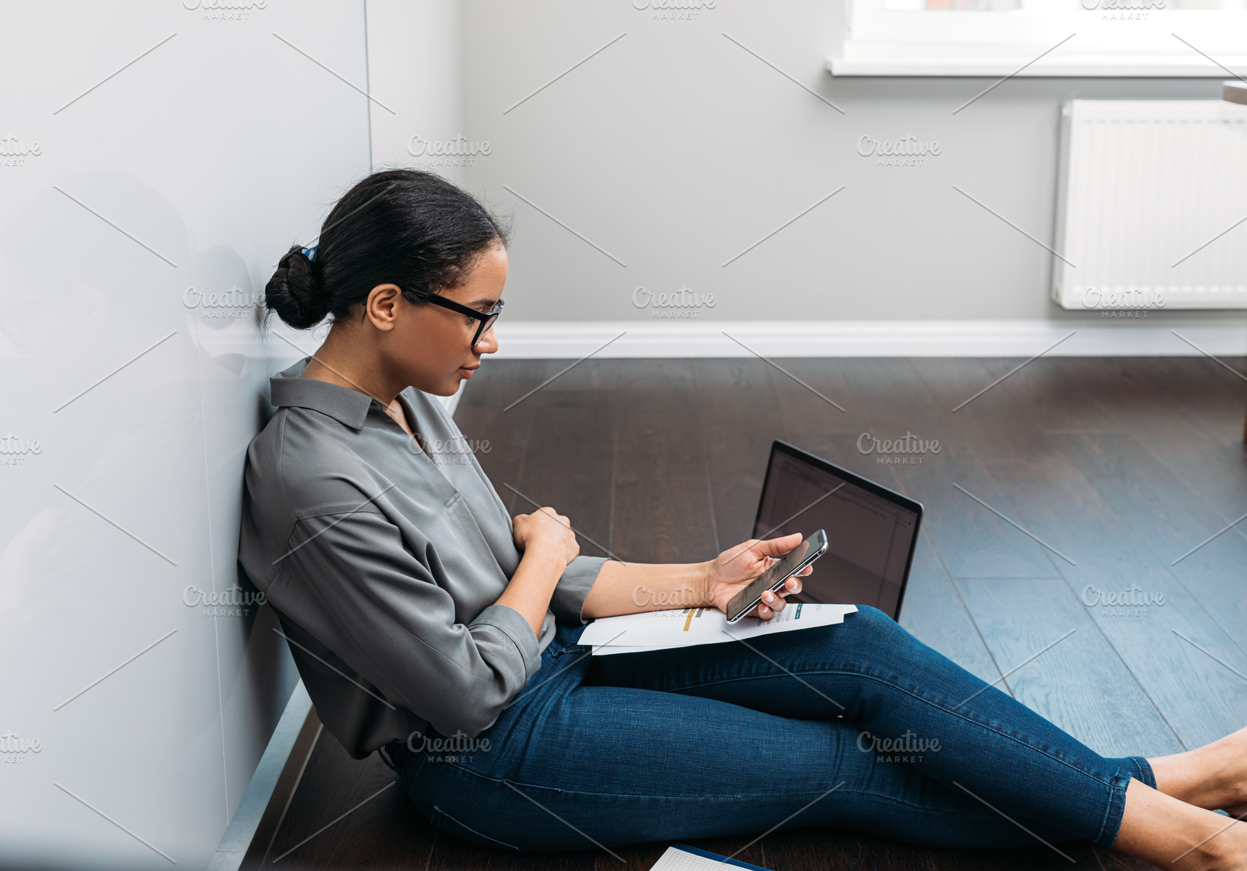 Side view of a young woman counting, a Business Photo by Artem Varnitsin