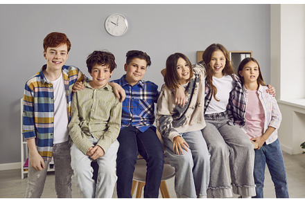 Group portrait of happy classmates