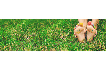 Children's feet with a pattern of, a Nature Photo by yanadjana